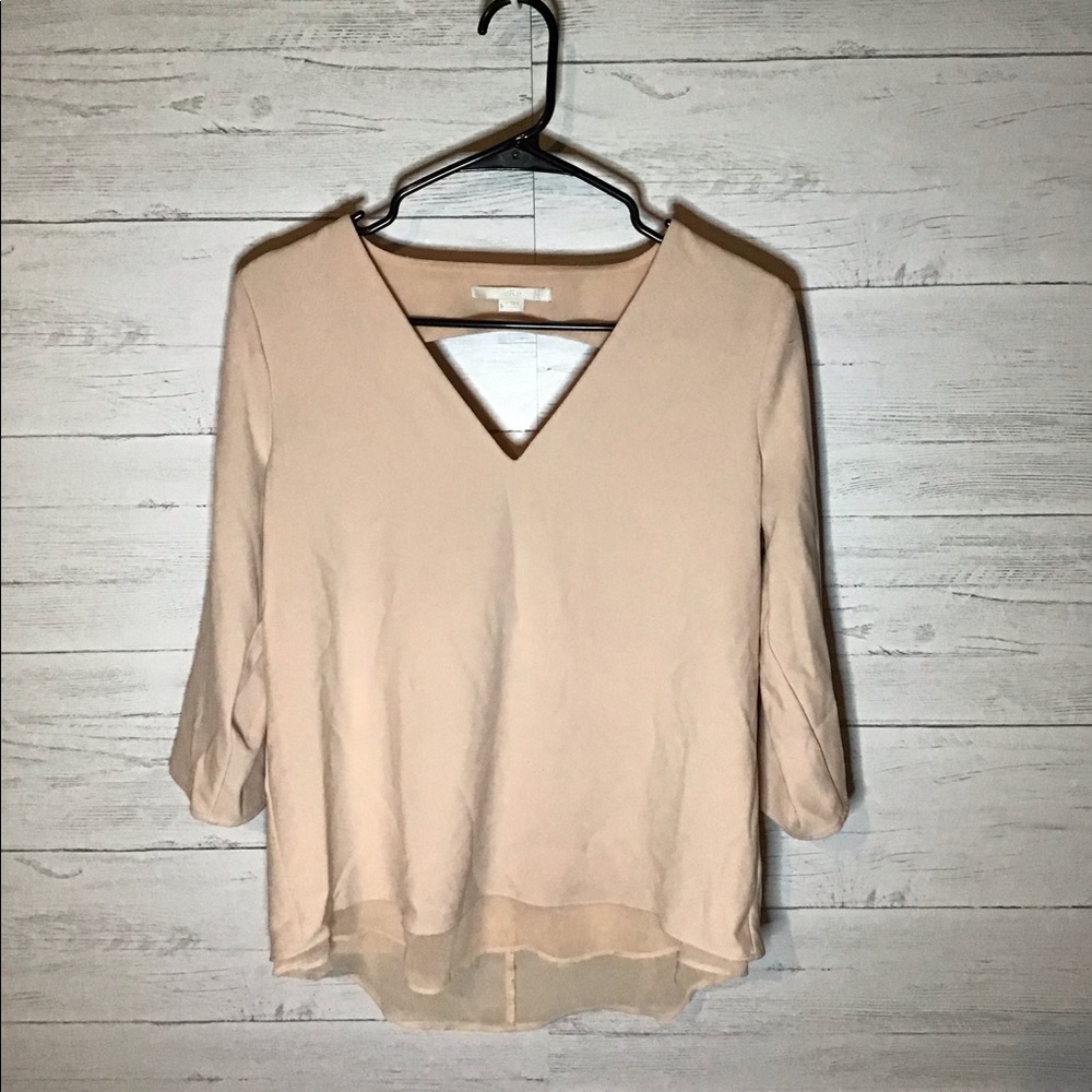 Peach colored v neck blouse